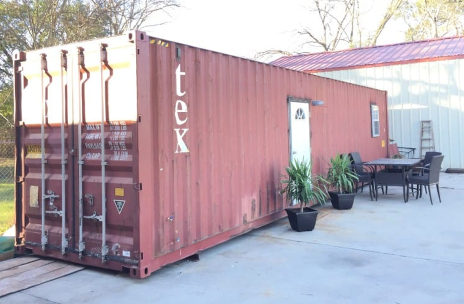 From the outside it looks like any old shipping container, but wait