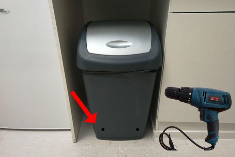 This is why you should drill two holes in the bottom of your garbage can